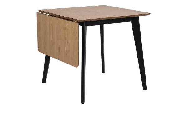 Ausklappbarer Esszimmertisch mit brauner Furnierplatte und schwarzen Holzbeinen