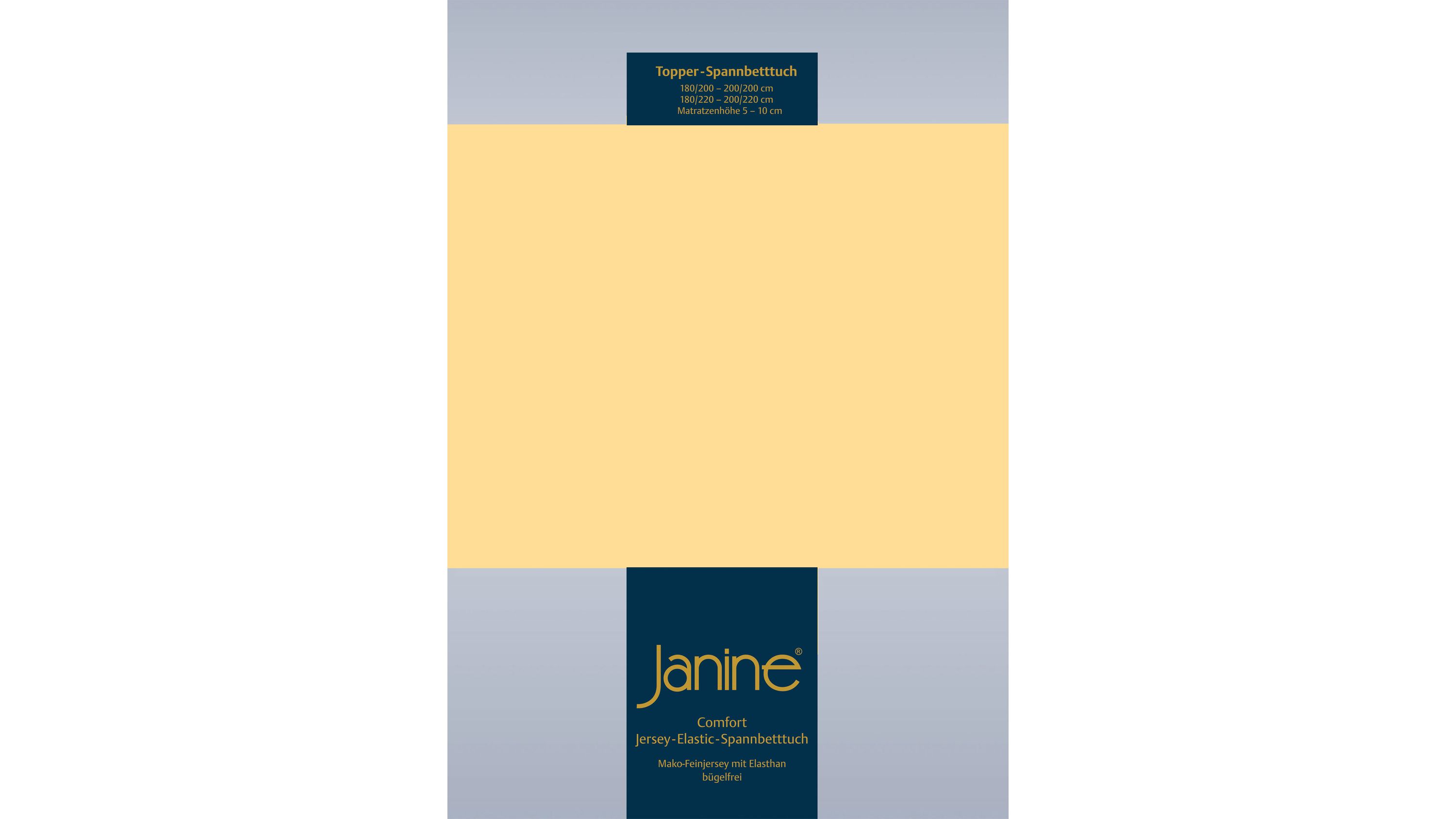 Spannbettlaken in hellgelber Farbe mit Verpackung und Aufschrift Janine