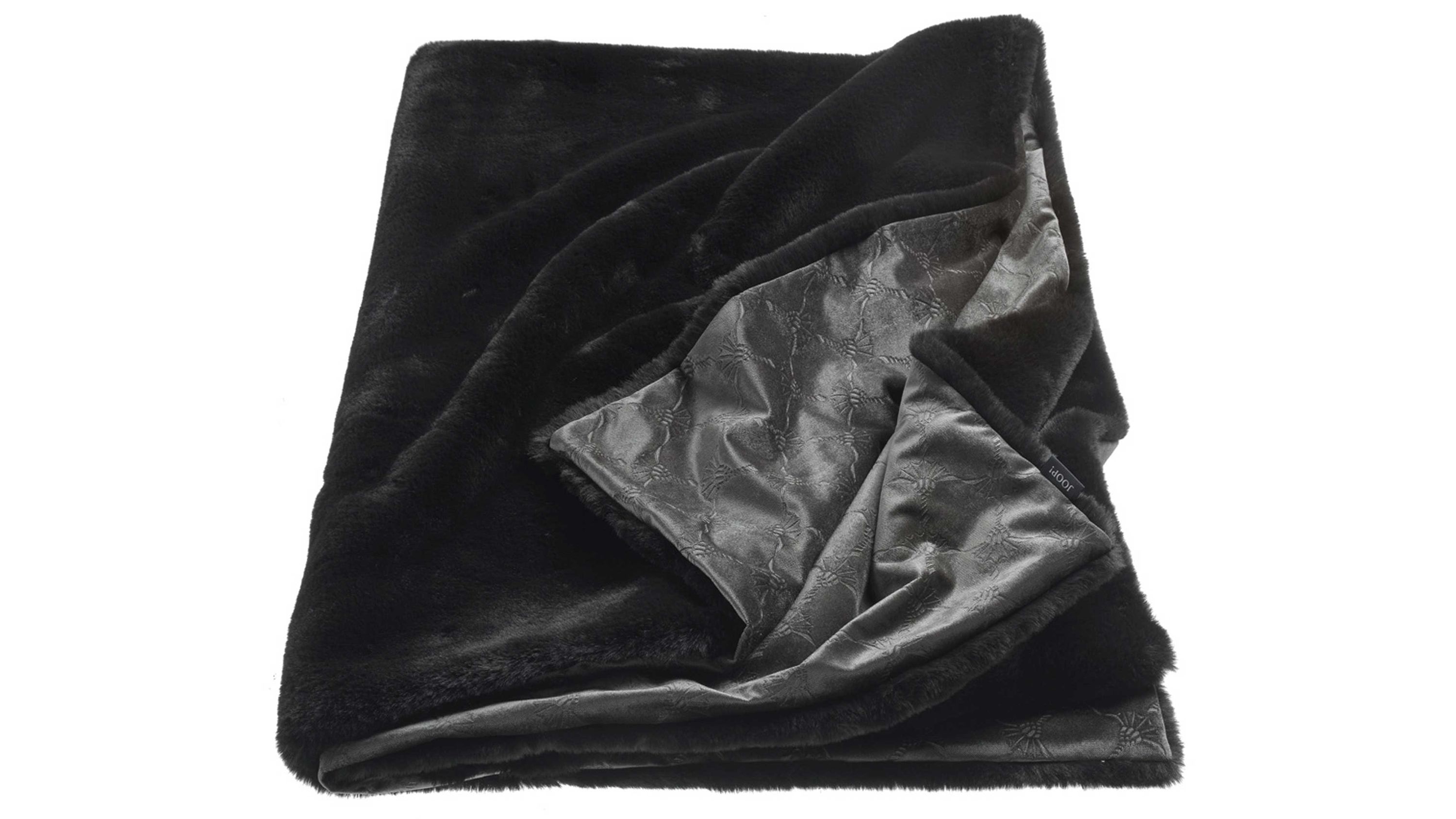 Schwarze Wohndecke mit glatter und weicher Oberfläche eine Seite plüschig andere Seite mit Muster
