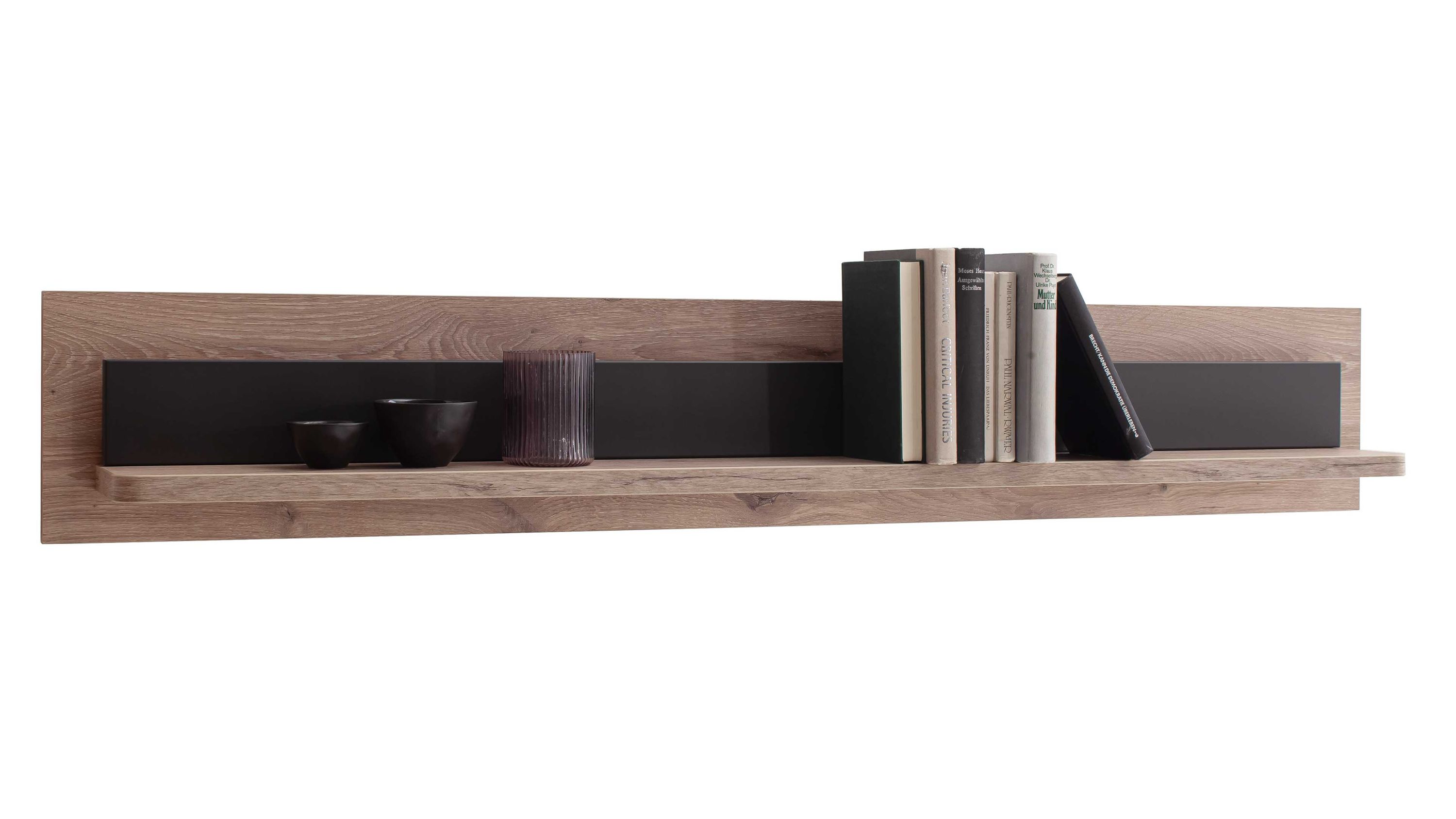 Wandregal aus Holz mit schwarzem Rückwandstreifen darauf Bücher und kleine Schalen