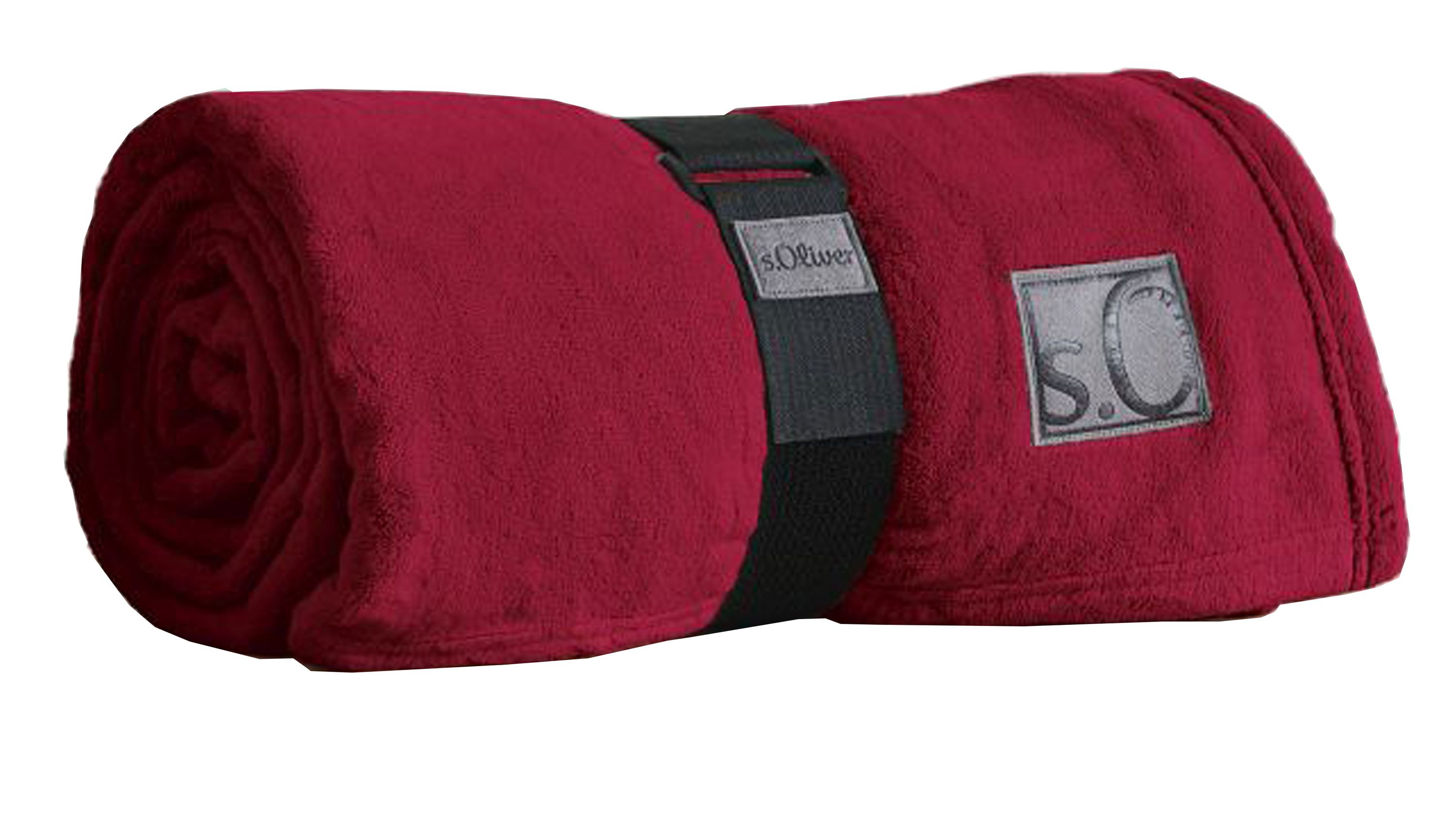Rote Wohndecke aus weichem Stoff zusammengerollt mit schwarzem Band